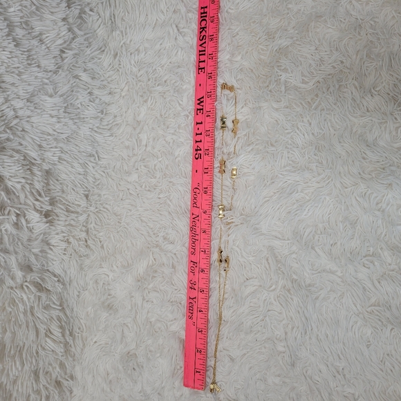 Kate Spade gold tone necklace with shiny bow charm - Picture 4 of 4